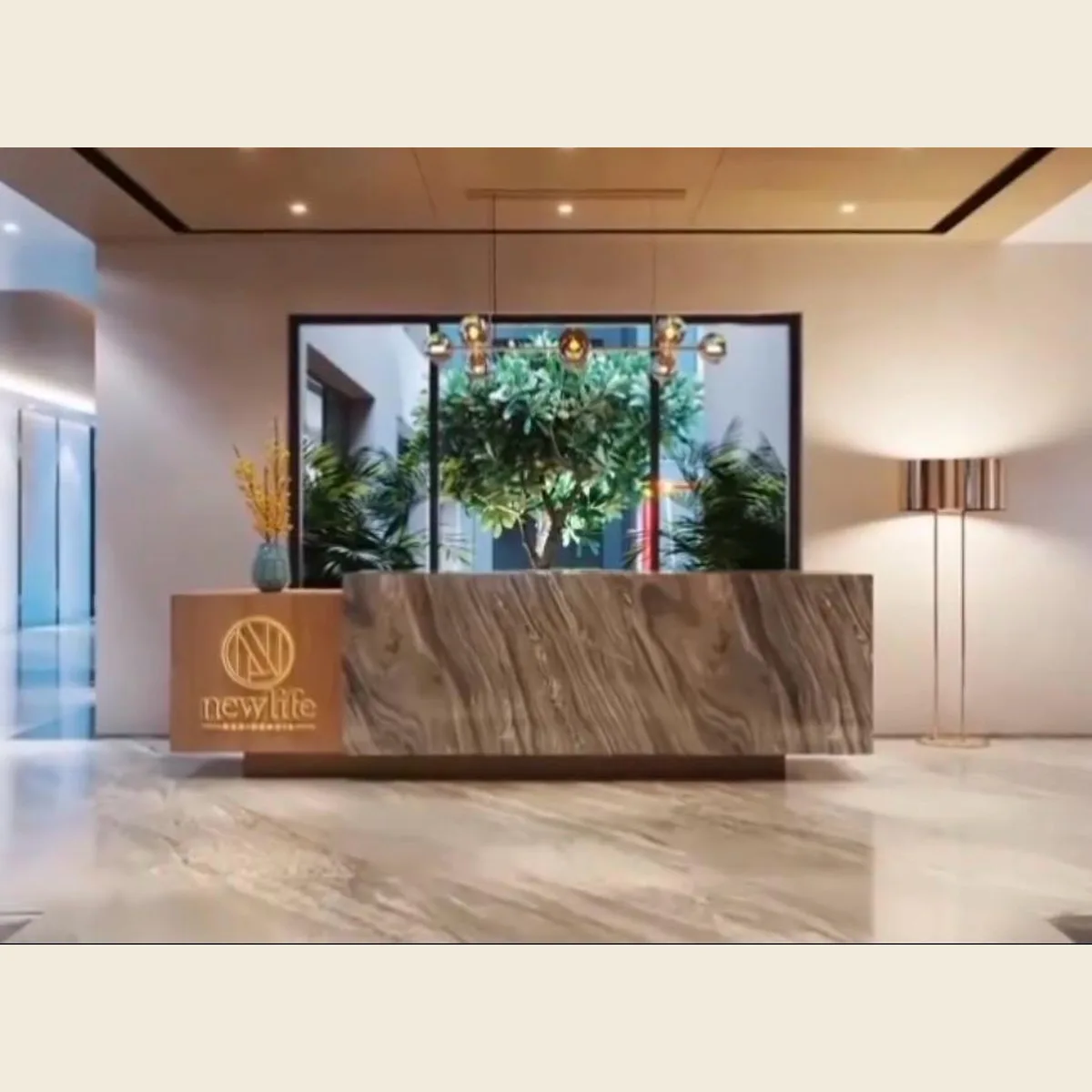 Projects New Life Residencia reception with marble desk