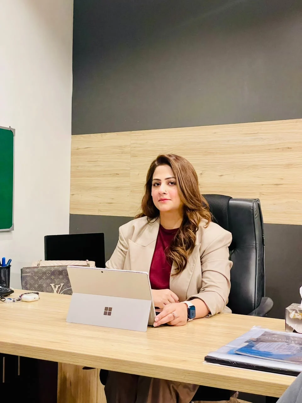 Yousfa Tariq at her desk in the Maskan Marketing office